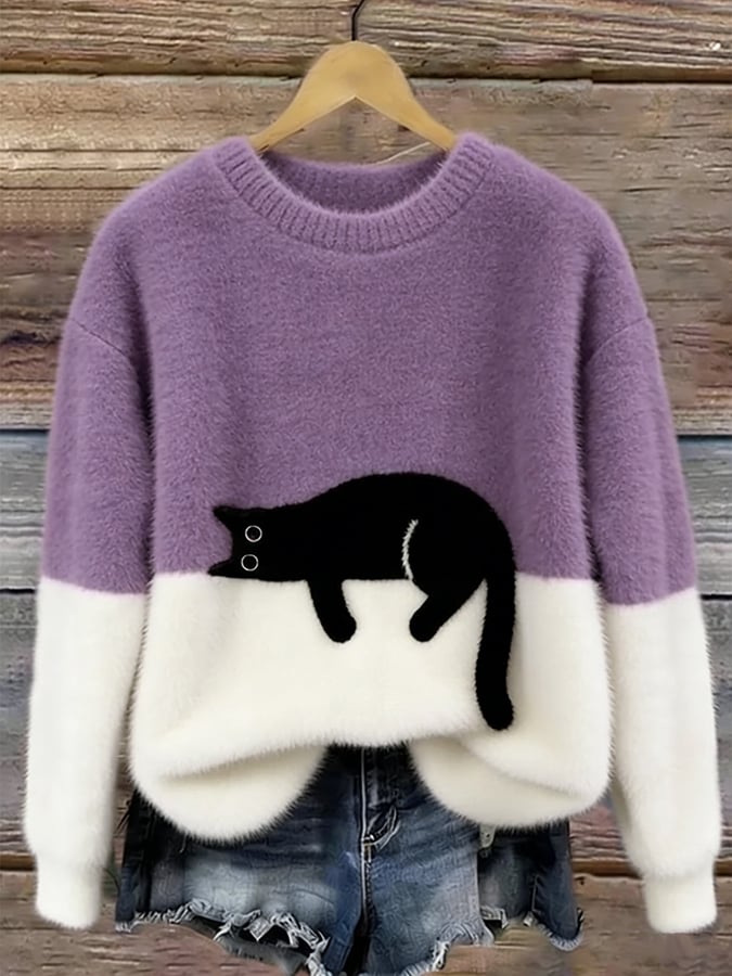 Cristina | Jersey oversize elegante con un gato