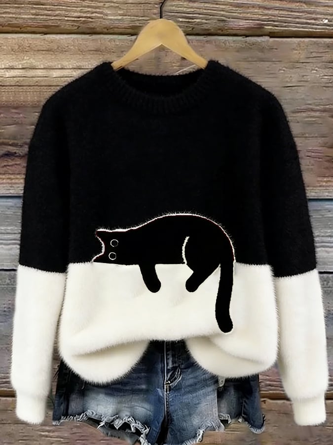 Cristina | Jersey oversize elegante con un gato