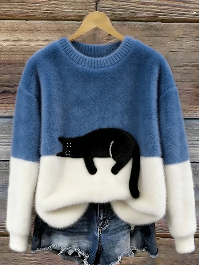 Cristina | Jersey oversize elegante con un gato