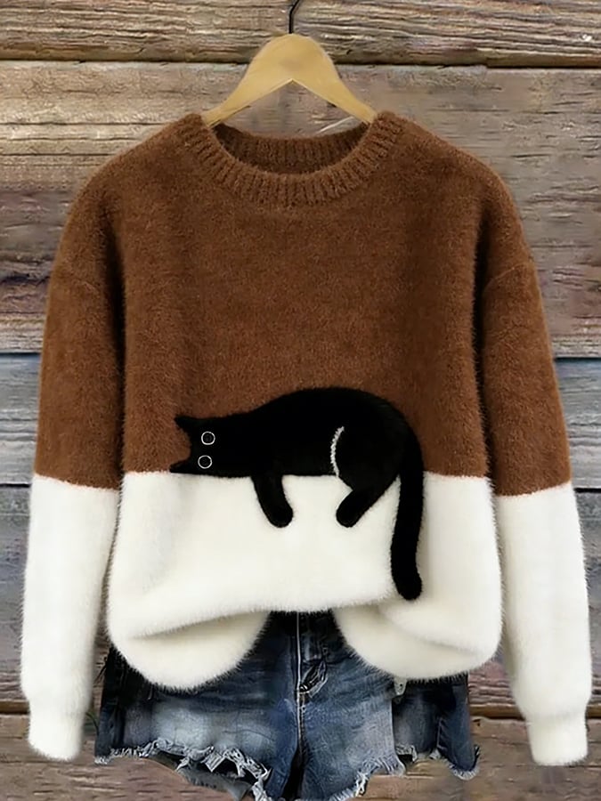 Cristina | Jersey oversize elegante con un gato
