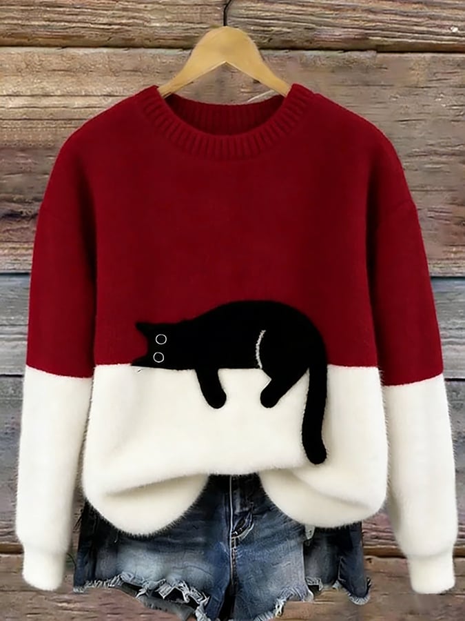 Cristina | Jersey oversize elegante con un gato