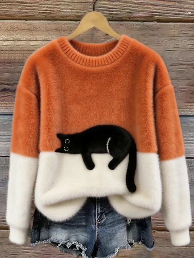 Cristina | Jersey oversize elegante con un gato